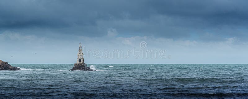 Lighthouse In A Stormy Sea Stock Photo Image Of Maritime Green