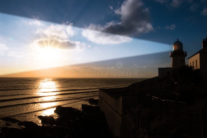 Lighthouse sunset beams