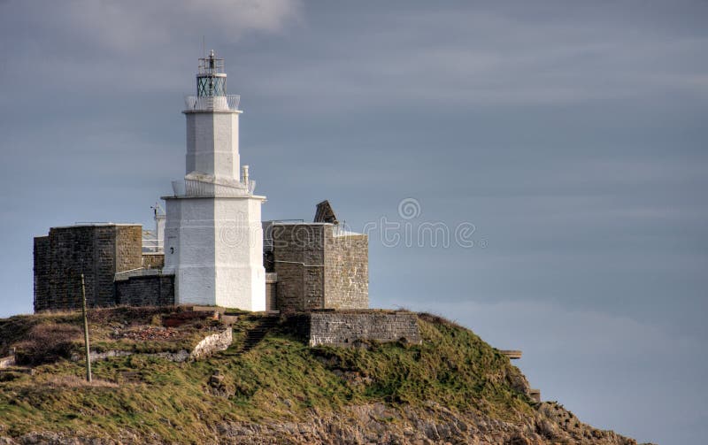 A Lighthouse in Swansea West Wales Stock Photo Image of light, clouds