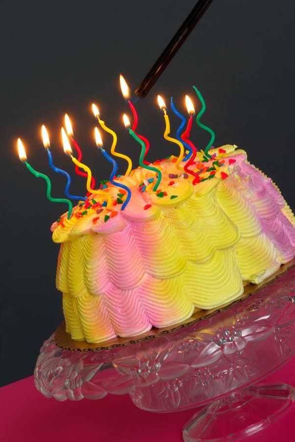 Lighting the Birthday Cake stock image. Image of gala 1831715