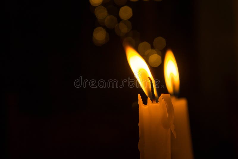 Lighting a Candle in the Night Stock Photo Image of glowing