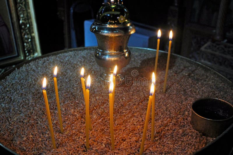 Lighting Candles Inside a Greek Orthodox Church Stock Photo Image of
