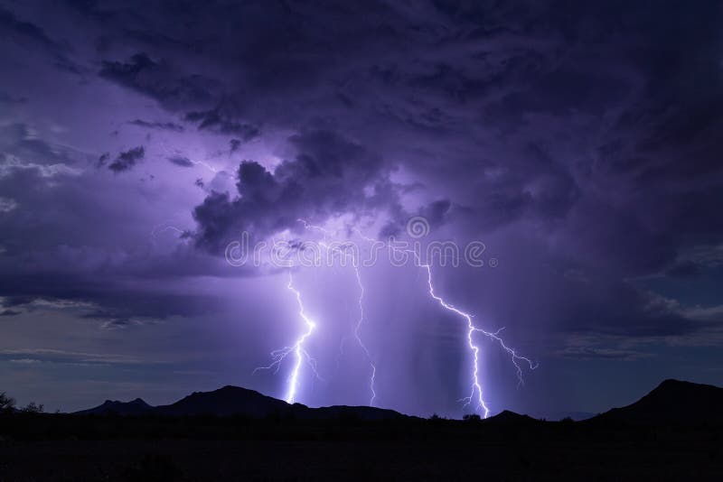 Lightning bolt thunderstorm background with rain and storm clouds.