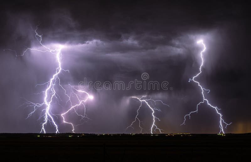 Lightning Bolts Strike the Ground from a Cloud Stock Photo Image of