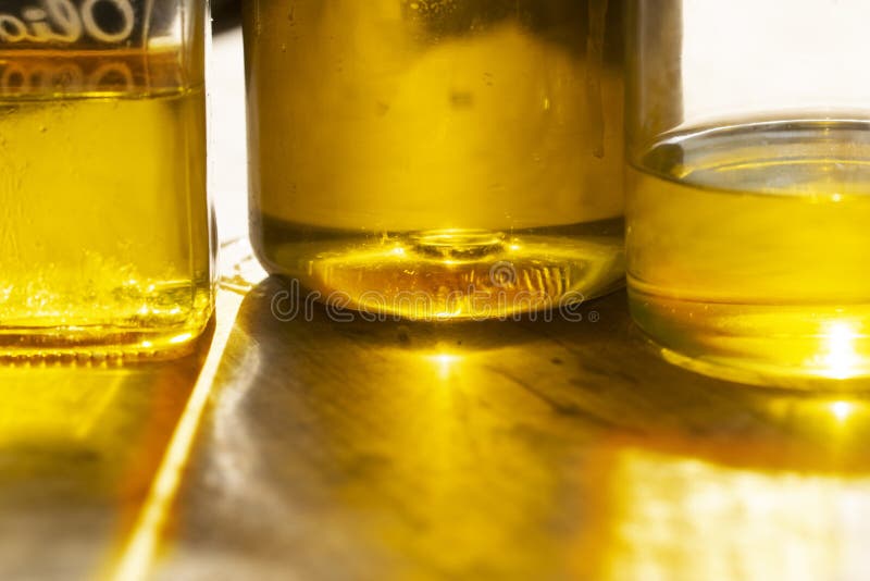 Lights of oil bottles stock photo. Image of health, bottle 245143076