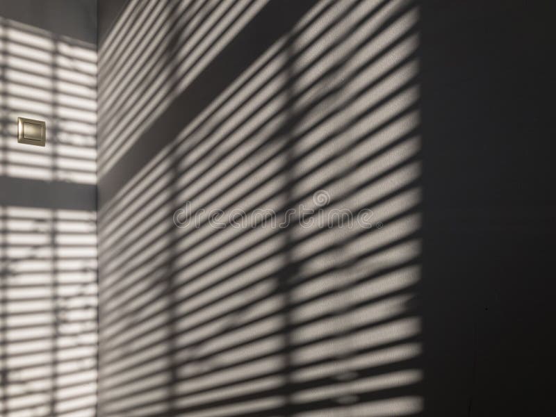 Lights shadows. Abstract light, black shadow overlay from window on white texture wall. Sunlight architecture background. Textures