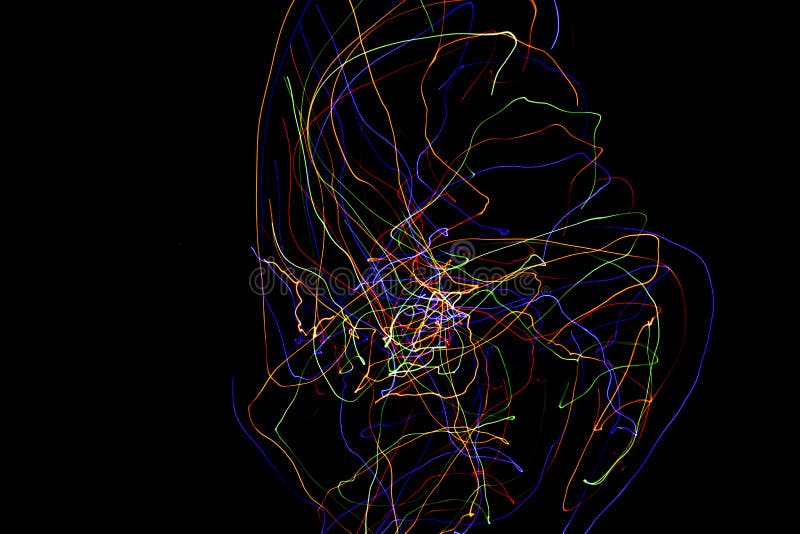 Lignes color?es abstraites sur le fond noir Photographie de peinture l?g?re avec les mod?les irr?guliers pour le recouvrement Res image libre de droits Lignes color?es abstraites sur le fond noir Photographie de peinture l?g?re avec les mod?les irr?guliers pour le recouvrement Res image libre de droits