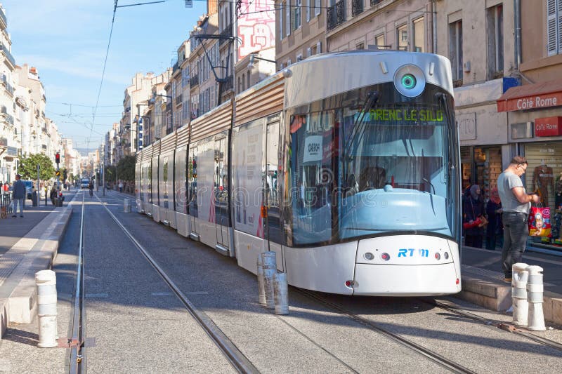 Marseille, France - March 23 2019: The Marseille tramway (French: Tramway de Marseille) is a tramway system consisting of three lines, serving 32 stations, and operating over 15.8 kilometres (9.8 mi) of route. Marseille, France - March 23 2019: The Marseille tramway (French: Tramway de Marseille) is a tramway system consisting of three lines, serving 32 stations, and operating over 15.8 kilometres (9.8 mi) of route