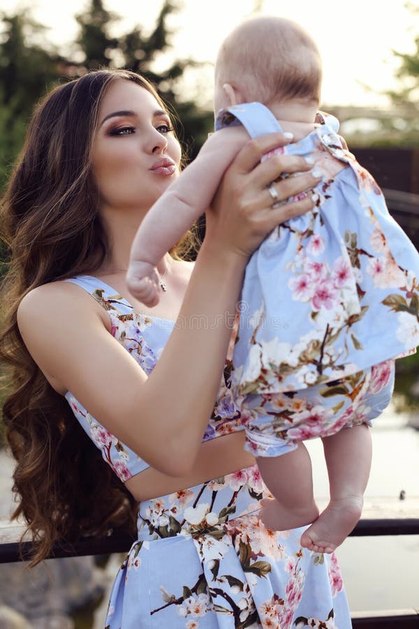 Like mother like daughter. beautiful family in similar dresses royalty free stock photo Like mother like daughter. beautiful family in similar dresses royalty free stock photo