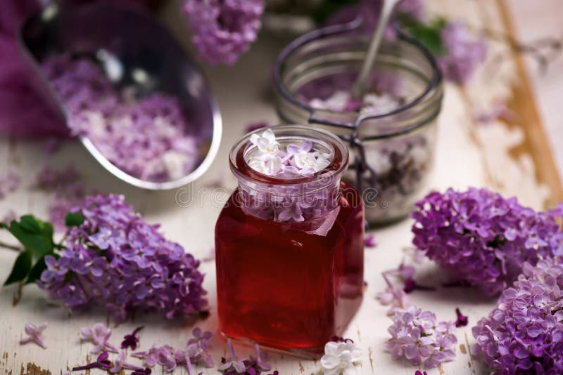 LILAC syrup in glass jar.Style vintage royalty free stock photos LILAC syrup in glass jar.Style vintage royalty free stock photos