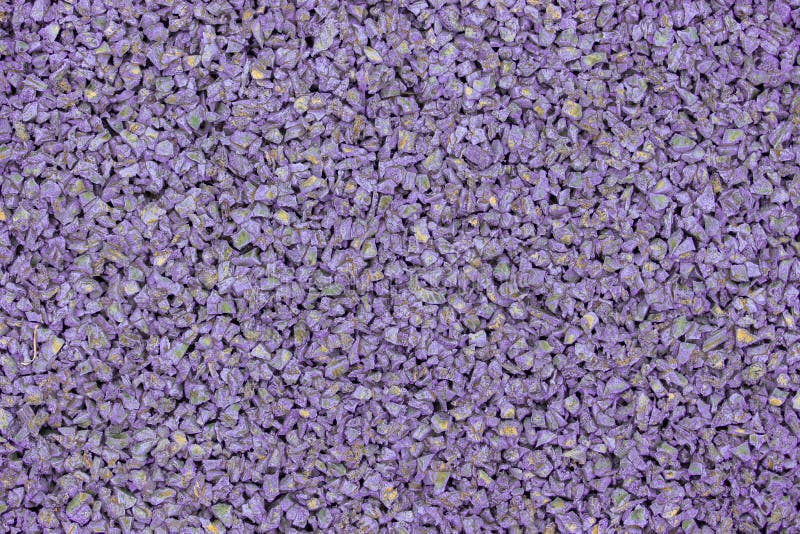Lilac violet rubber coating for children playground. Texture granular background. Outdoor floor covering for sports fitness games royalty free stock photos Lilac violet rubber coating for children playground. Texture granular background. Outdoor floor covering for sports fitness games royalty free stock photos