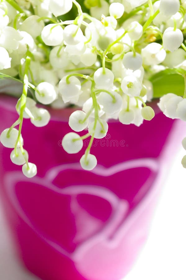 Lily of the valley in a heart vase