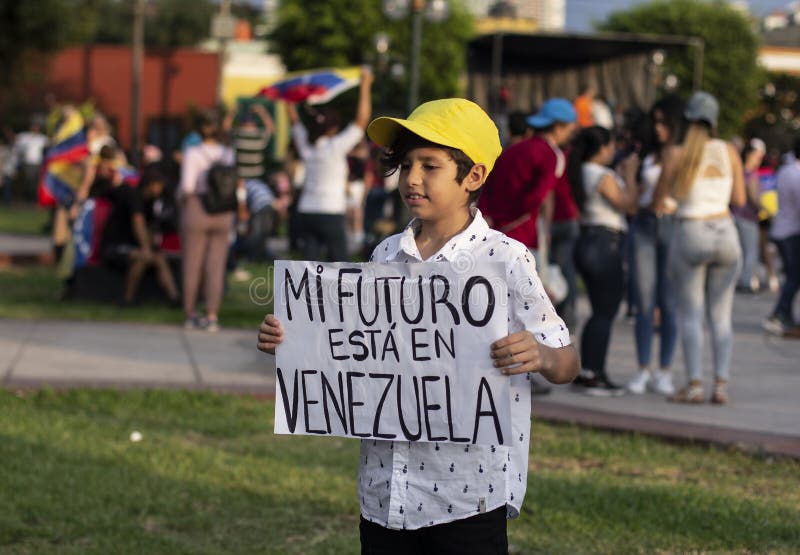 Cute little boy holding sign at protest royalty free stock image Cute little boy holding sign at protest royalty free stock image