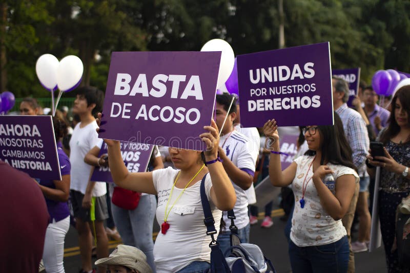 Group of Peruvian girls protesting for the stop of harassment at march for woman`s day stock photo Group of Peruvian girls protesting for the stop of harassment at march for woman`s day stock photo