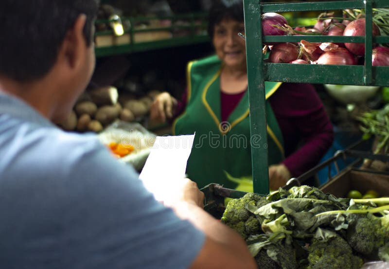Female Peruvian seller at a vegetables market royalty free stock photos Female Peruvian seller at a vegetables market royalty free stock photos