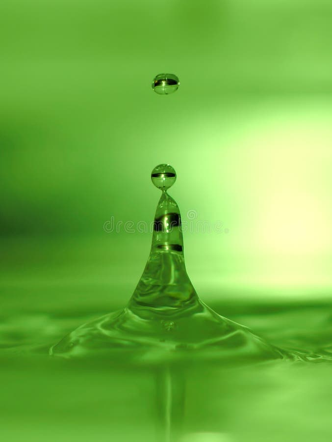 Lime green water drops stock image. Image of moment, pouring - 28617