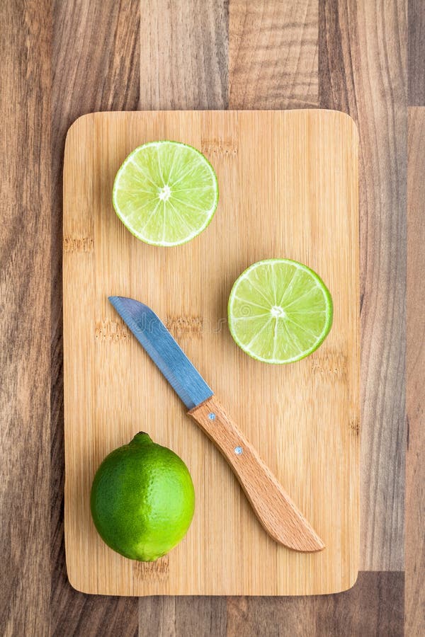 Lime Knife Chopping Board stock photo. Image of cooking 62208228
