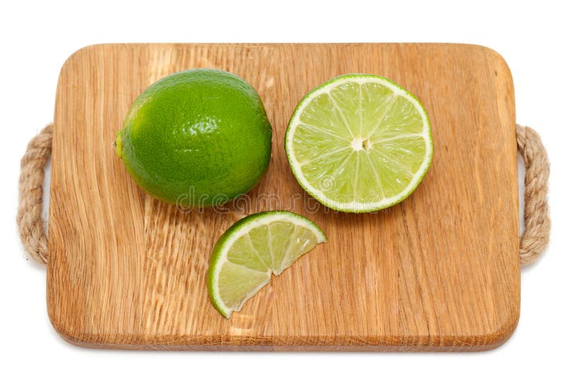 Lime on Wooden Cutting Board Stock Image Image of diet, wood 32268605