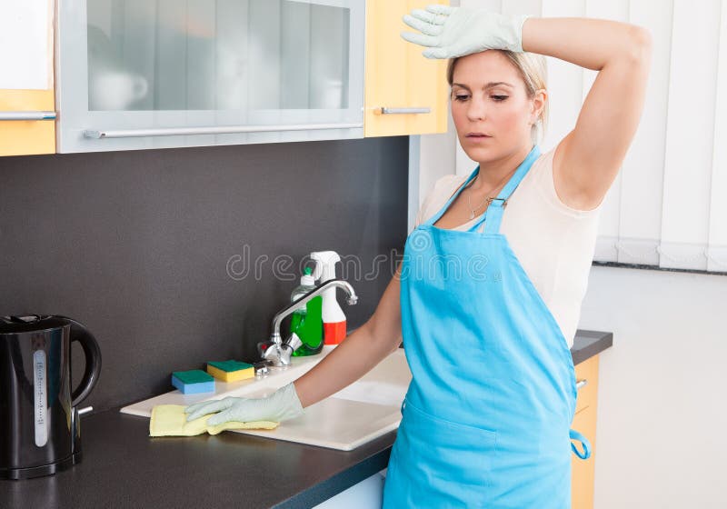 Limpeza cansado da mulher imagens de stock Limpeza cansado da mulher imagens de stock