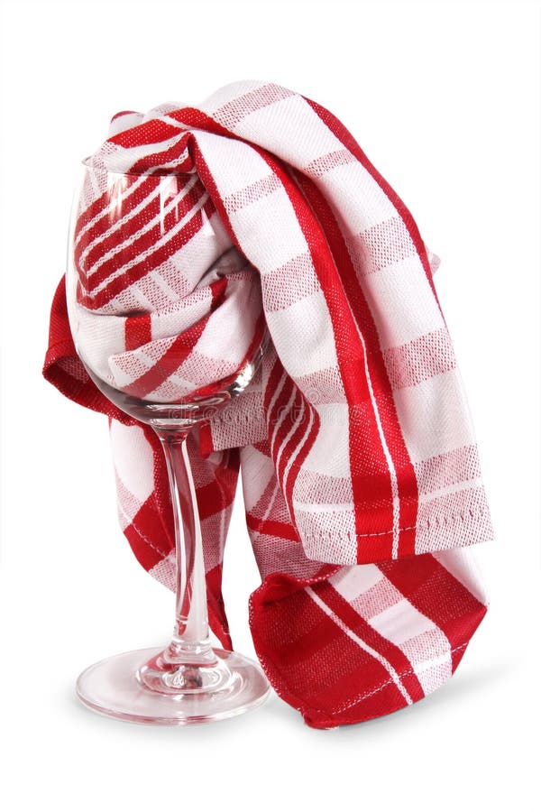 Limpie las copas de vino con los platos imagen de archivo