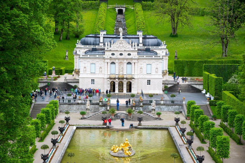 Ettal, Germany - June 5, 2016: Linderhof Palace in Baviera, Germany, one of the castles of former king Ludwig II. Ettal, Germany - June 5, 2016: Linderhof Palace in Baviera, Germany, one of the castles of former king Ludwig II.