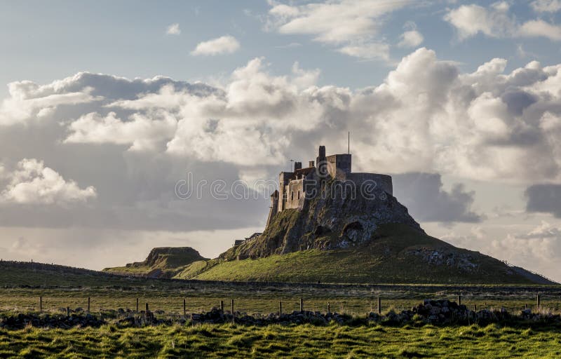 Lindisfarne Castle, Holy Island. Northumberland, England, in early morning just after sunrise. Lindisfarne Castle, Holy Island. Northumberland, England, in early morning just after sunrise.