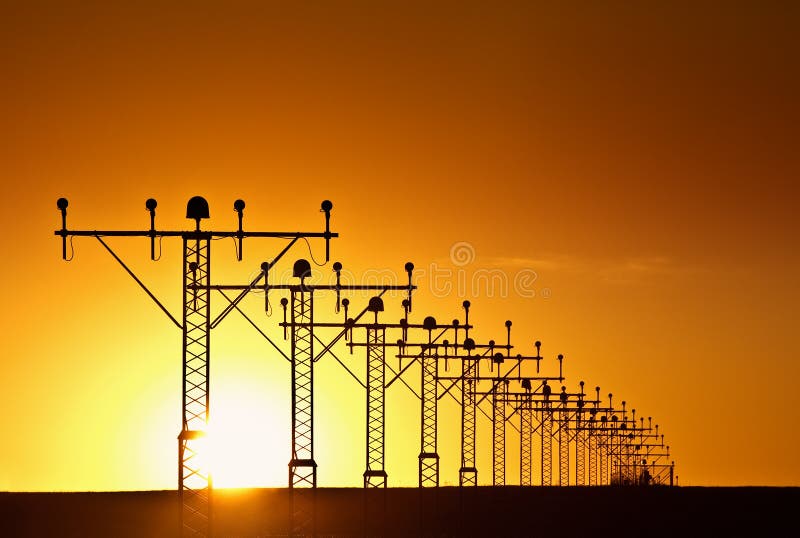 Line of lamp posts guiding planes to the airport