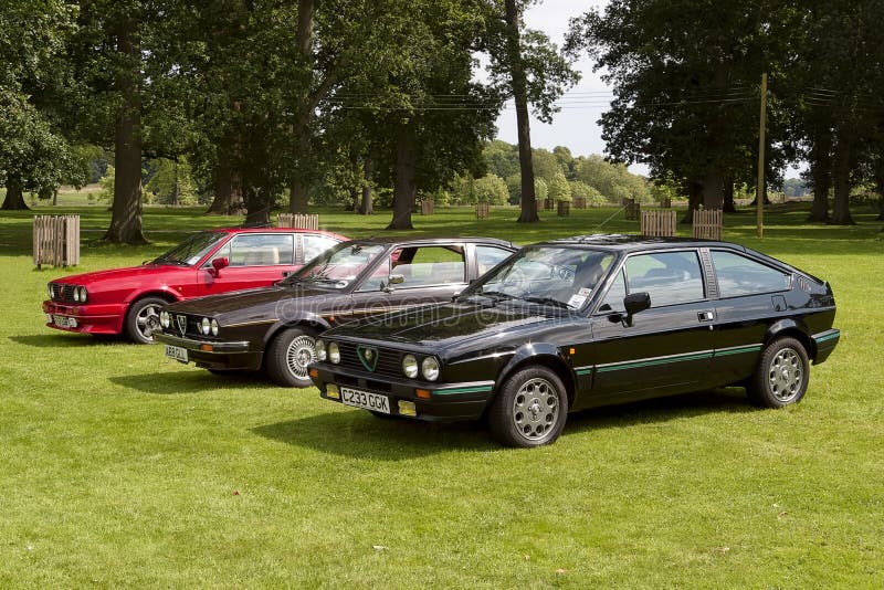 Warminster, Wiltshire, UK - July 25 2004: A line-up of classic Alfa Romeo cars