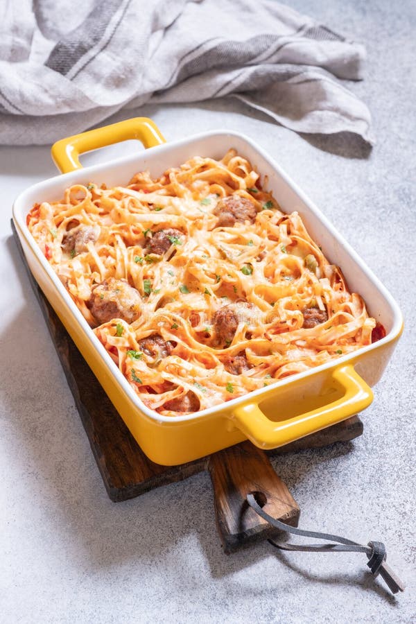 Linguine Baked with Meatballs Tomato Sauce and Cheese Stock Photo