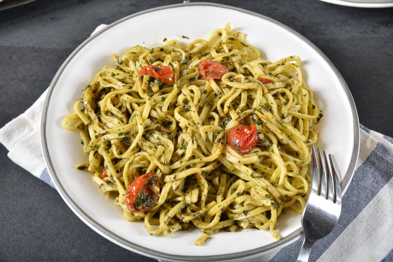 Linguine with basil pesto stock photo. Image of italian 166137054