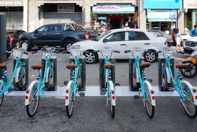 Linkbike, automatic rentable bike stand on the road in old town stock photography Linkbike, automatic rentable bike stand on the road in old town stock photography