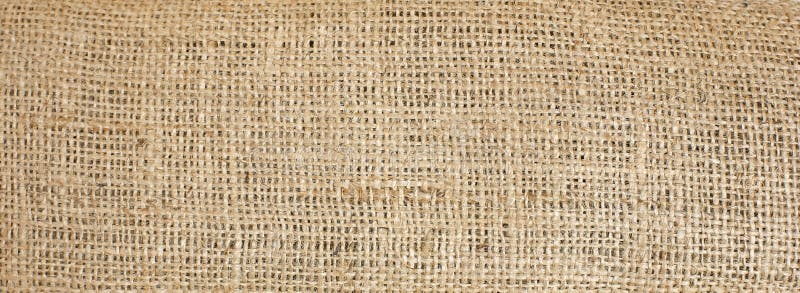 Brown coloured texture woven linen background. Brown coloured texture woven linen background