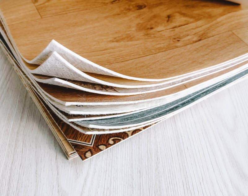 Linoleum Cut into Pieces. Samples of Flooring in a Bundle Stock Photo