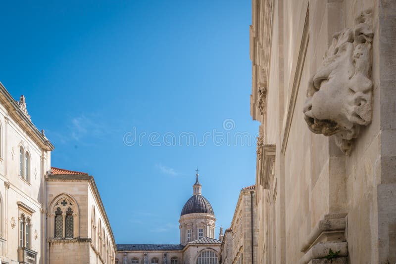 Sculpture and Church tower dome in Dubrovnik