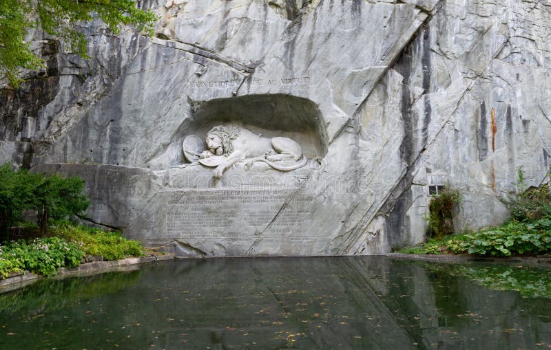 The Lion of Lucerne overlooks the nearby garden and pool. The Lion of Lucerne overlooks the nearby garden and pool