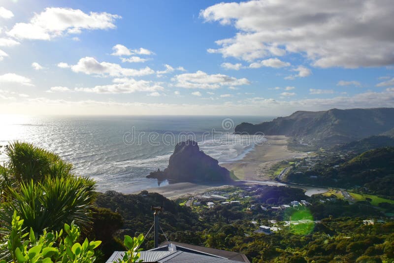 The Lion Rock is Piha Beach`s most iconic landmark, at west coast Waitakere in New Zealand royalty free stock photography The Lion Rock is Piha Beach`s most iconic landmark, at west coast Waitakere in New Zealand royalty free stock photography