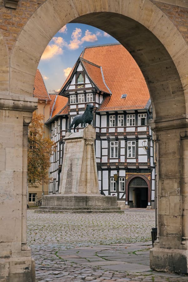 Lion statue and old timbered house in Braunschweig patio