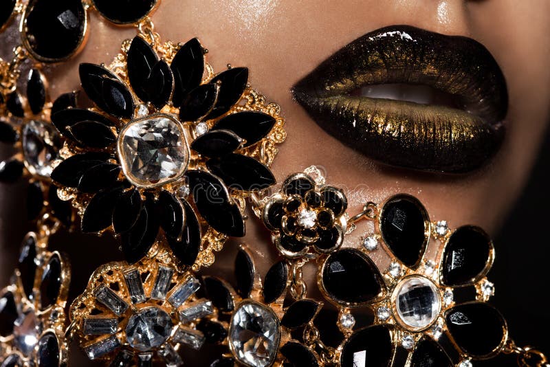 Gold Jewelry. Fashion Lips Makeup & Diamond Ring Stock Photo Image