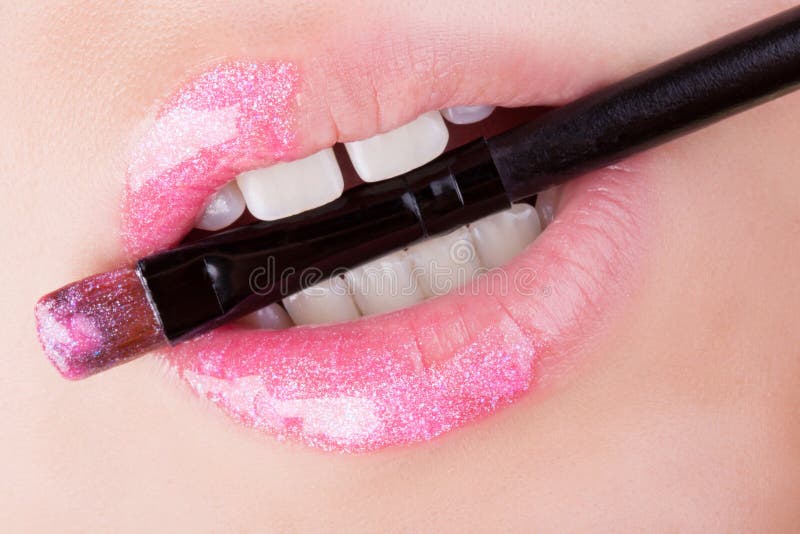 Lips with pink glitter. stock photo. Image of glossy 60545354