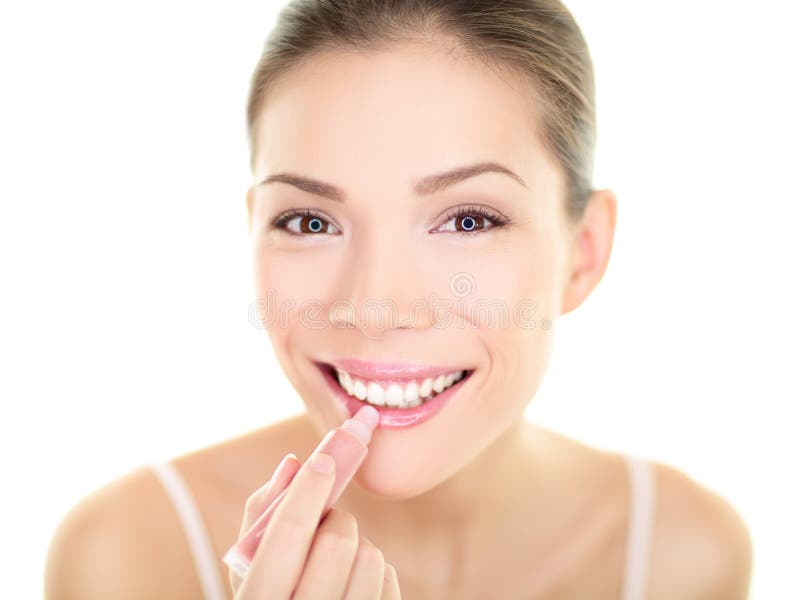 Lipstick makeup woman putting lip balm care beauty stock photography Lipstick makeup woman putting lip balm care beauty stock photography