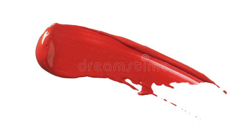 Lipstick smear smudge swatch isolated on white background. Make up cream texture. Bright red color cosmetic product brushstroke