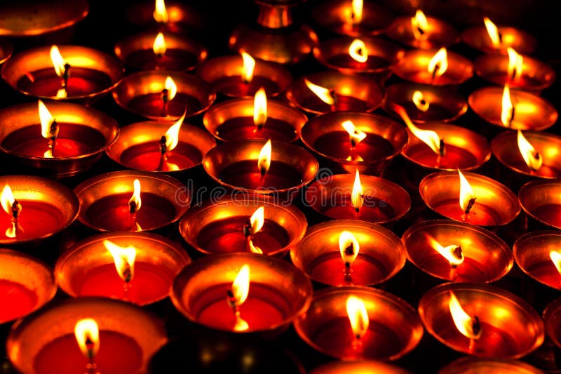 Liquid candles in the dark Shree Boudhanath temple