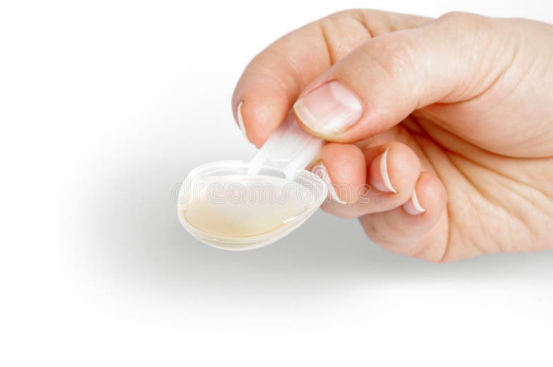 Liquid drugs in a spoon stock photo. Image of medication 21573372