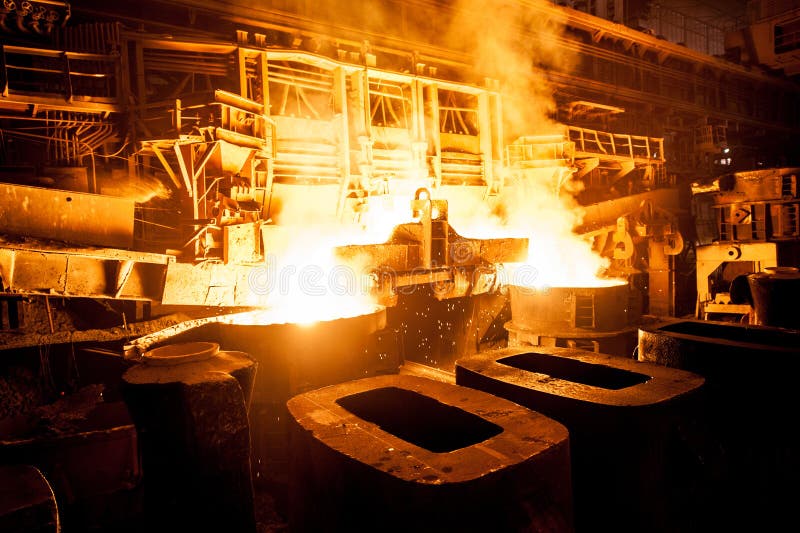 Liquid steel in the tanks stock image. Image of burning 88784417