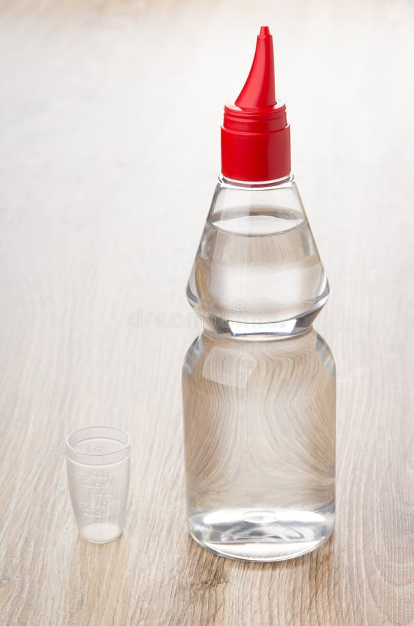 Liquid Sugar Substitut in Plastic Bottle with Measure Cap Stock Image