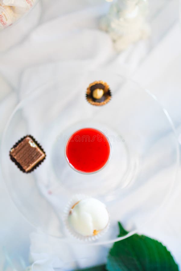 Liquor and candies on a plate. Serving holiday table. Liquor and candies on a plate stock photos Liquor and candies on a plate. Serving holiday table. Liquor and candies on a plate stock photos