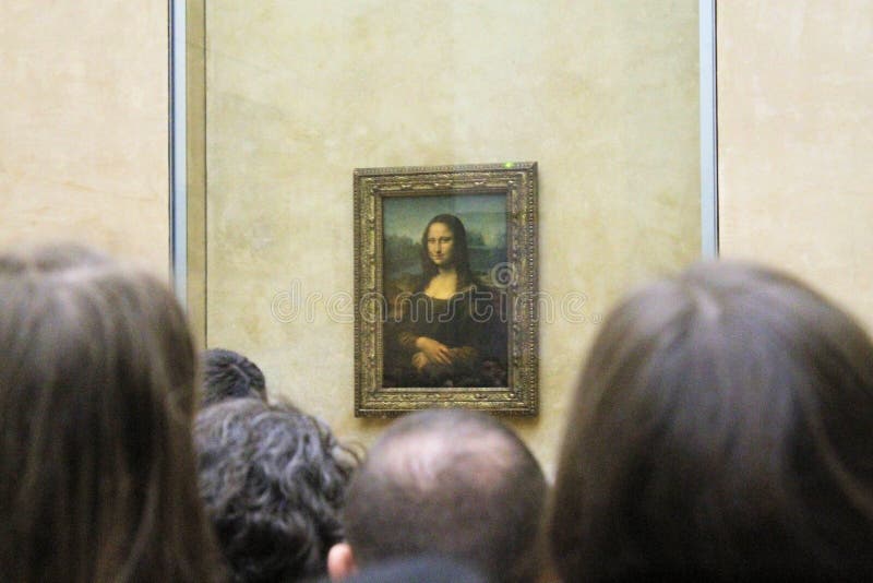 Paris France -04/06/2018 : Leonardo DaVinci`s `Mona Lisa` at the Louvre Museum May 13 2015 in Paris France. The painting is one of the world`s most famous. Paris France -04/06/2018 : Leonardo DaVinci`s `Mona Lisa` at the Louvre Museum May 13 2015 in Paris France. The painting is one of the world`s most famous.