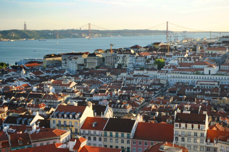 Aerial view of city of Lisbon with bridge in background, Portugal. Aerial view of city of Lisbon with bridge in background, Portugal.