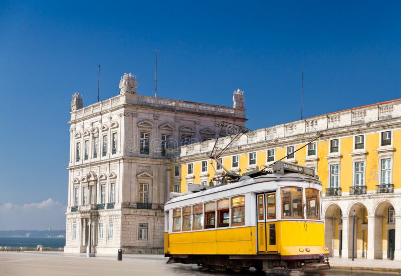 Lisbon yellow tram at Praca de Comercio, Portugal