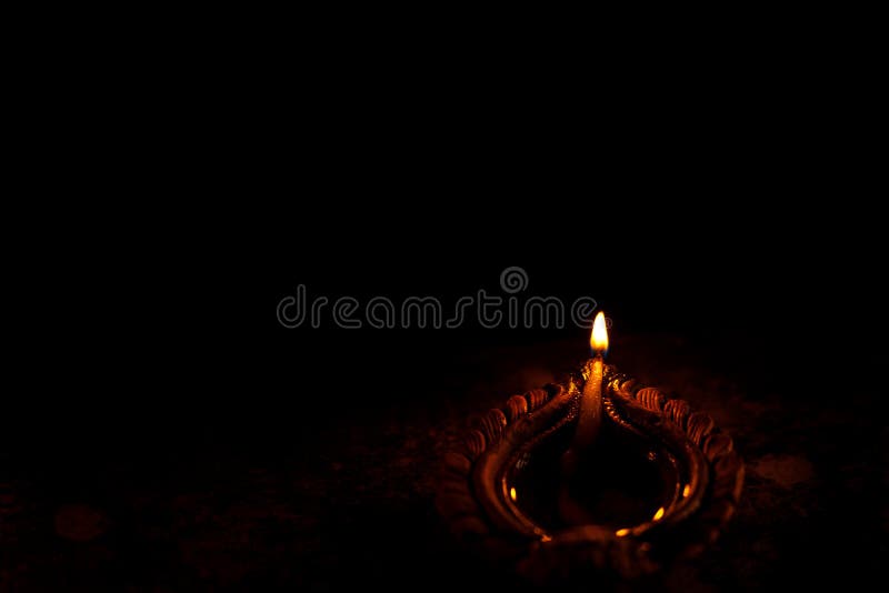 Lit Diwali Diya Background stock image. Image of clay - 161270037